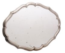 A Continental silver rimmed cake stand, of cartouche-shaped outline with mirror panelled base,