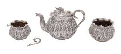 An Indian three piece silver bachelor's tea set, unmarked, possibly Madras,