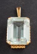 An octagonal, step-cut aquamarine pendant, estimated aquamarine weight ca. 16.