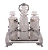 WITHDRAWN A George V silver eight bottle cruet frame, William Eaton, London, 1821,