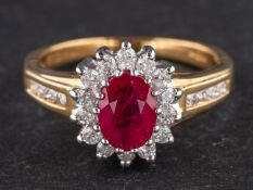 An 18ct gold, oval, mixed-cut synthetic ruby and diamond cluster ring, total diamond weight ca. 0.