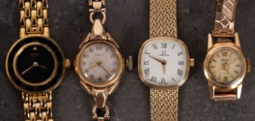 Omega Quartz a 9ct gold lady's wristwatch the white cushion dial with Roman numerals and signed