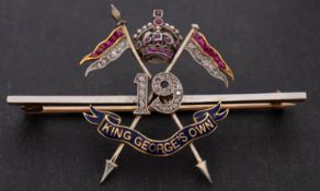 A 19th King George V's Own Lancers Regimental Badge, set with mixed-cut rubies and diamonds,