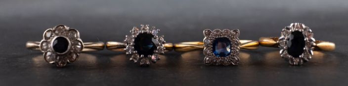 Four sapphire and diamond cluster rings, including an 18ct gold ring,