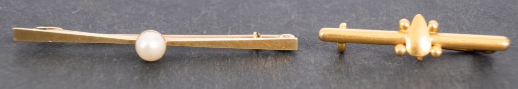 Two bar brooches, including a bar brooch with a cultured pearl,