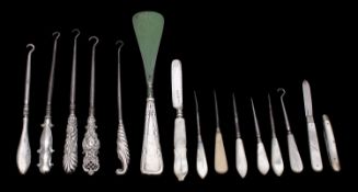 A collection of five silver handled button hooks, various dates and maker,