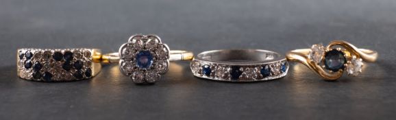 Four sapphire and diamond rings, including a half-eternity ring, marked '18CT',