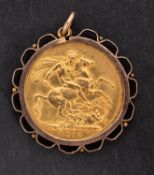 A George V gold sovereign coin, dated 1912, mounted as a pendant, diameter of coin ca.