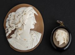 Two shell cameos both depicting the head of a lady in profile, one mounted as a pendant, lengths ca.