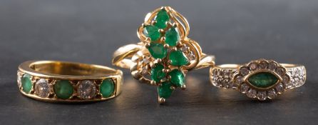 Three emerald and diamond rings, including an 18ct gold, five-stone ring,
