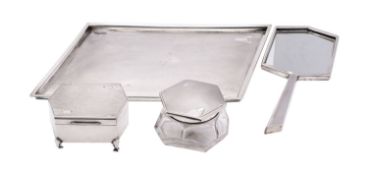 An Art Deco four piece silver dressing table set, Walker and Hall, Sheffield, 1934,