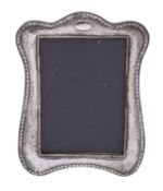 WITHDRAWN A George V silver photograph frame, Boots Pure Drug Company, Birmingham, 1921,