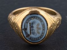 A Victorian, sardonyx mourning ring, engraved with heraldic device,