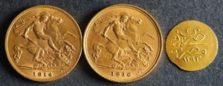 Two Georgian Gold Sovereigns dated 1914 and 1916, with a small gold coin.