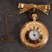 An 18ct gold half-hunter fob watch with gold bow,