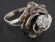 A 9ct gold CZ ring, of flowerhead design, with hallmarks for London, 1974, length of ring head ca.