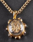 A rock crystal pendant, with applied, mounted, monogram, length (inc bale) ca. 4cm, weight ca. 12.