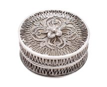 An English silver filigree gaming counter box, un- marked possibly 18th century, of circular form,