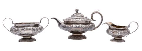 A George IV silver three piece tea service, maker William Hunter II,