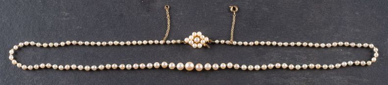 A graduated, cultured pearl necklace, the cultured pearls of white hue with pinkish overtones,