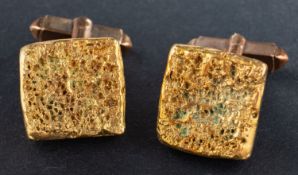 A pair of textured, square cufflinks, length of cufflink head ca. 1.8cm, total weight ca. 36.6gms.