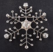 An old and rose-cut diamond, snowflake brooch, total estimated old-cut diamond weight ca. 1.