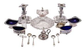 A pair of early 19th century silver plated salts, with pierced decoration and blue glass liners,