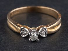 Three diamond three-stone rings, including a 9ct gold ring, total estimated diamond weight ca. 0.