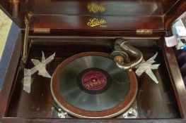 A Selecta floor standing gramophone, together with a collection of 78rpm records.