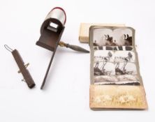 A Holmes pattern stereoscope viewer together with a set of 'The Battle- Field Series' stereoscope