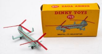 Dinky 715 Bristol 173 helicopter, turquoise, silver and red with red blades, in a yellow card box.