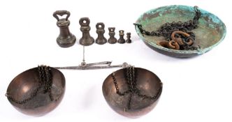 A set of Georgian steel balance scales with copper pans,