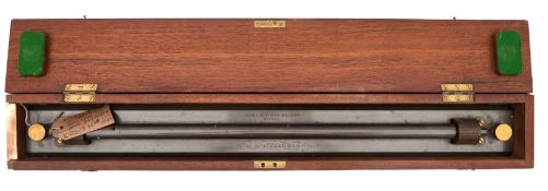 A lacquered brass rolling rule by Kelvin, James & White, Ltd. Glasgow.