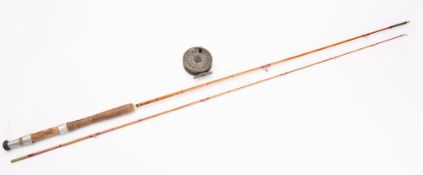 A two piece split cane Palace No. 5 rod, together with a Rimfly reel.