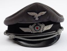 A Luftwaffe Officer's Peaked cap, grey with silver cord,