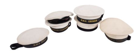 A Royal Navy white peaked cap, maker Gieves & Hawkes, London together with a group of five No.