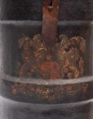 An early 20th century black canvas charge or shot container: with brown leather strap and handle,