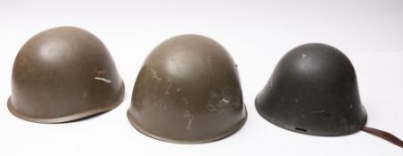 Two Russian/Hungarian Steel helmets and a WW2 type Romanian helmet (3)