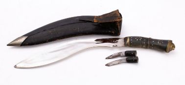 An early 20th century horn handled kukri,