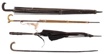 An Edwardian simulated bamboo and gilt metal mounted 'Paragon' parasol by S.