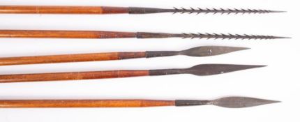 Two Dinka fishing spears together with three West and East Africa iron tipped spears (5) (all