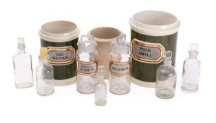 A small group of apothecary jars and bottles,