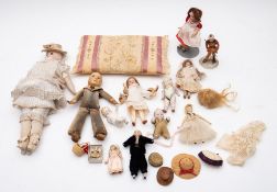Antique Dolls; a collection of nine miniature mainly porcelain headed dolls house dolls,