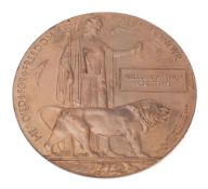 A World War One Memorial Death plaque to William Arthur Griffiths, in wax envelope of issue.