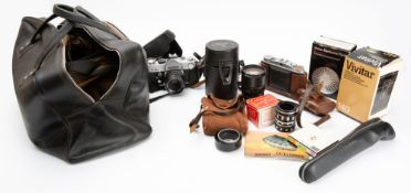 A Petri TTL 35 mm SLR camera, together with collection of Vivitar lenses and other accessories.