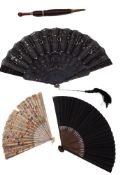 A late 19th century ebony and lace fan,
