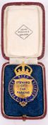 A John Plinches gilt and enamel' Steward of Parking' lapel badge,