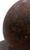 A 3.5 inch 5lb canon ball on wooden stand 'Souvenir of the Siege of Newark 1644.