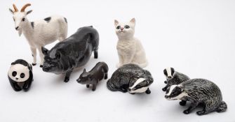 A Royal Doulton Vietnamese Pot-bellied Pig and Piglet; together with Pigmy Goat,