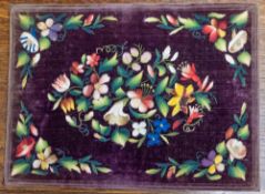 A Victorian embroidered scrap album containing Christmas and New Year greeting cards and decoupage.